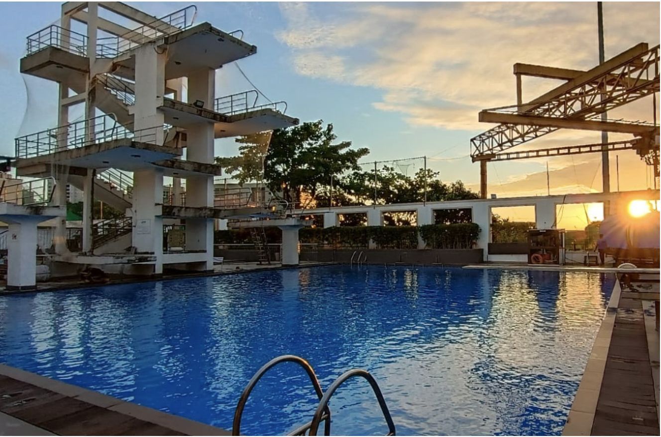 Goregaon Sports Club diving pool and platform at sunset